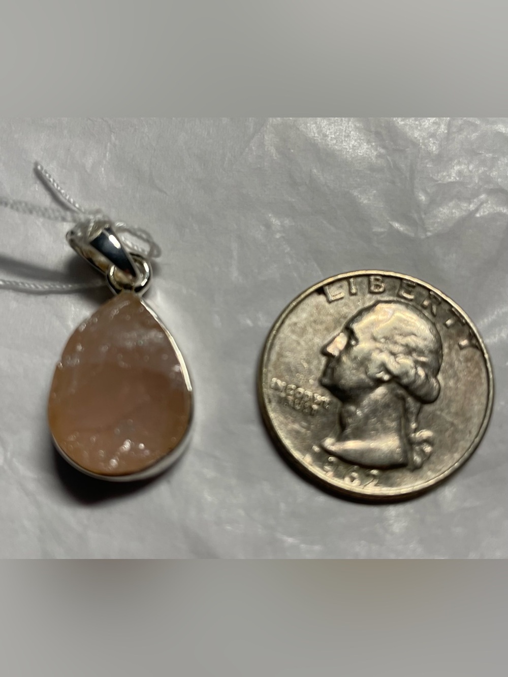 Raw finish rose quartz pendant